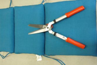 Typical manually operated hedge shears for pruning shrubs. 
