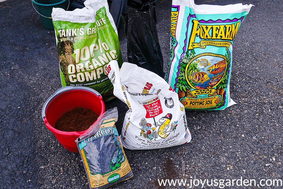 Hoya (Wax Plant) Houseplant Repotting: When, How & The Mix To Use 6 materials used for repotting hoya houseplants sit on an asphalt driveway